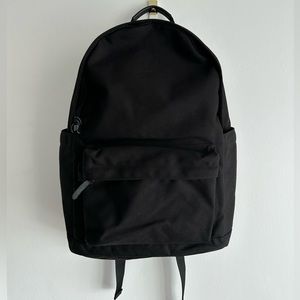 Uniqlo black backpack. Used once. Perfect condition.